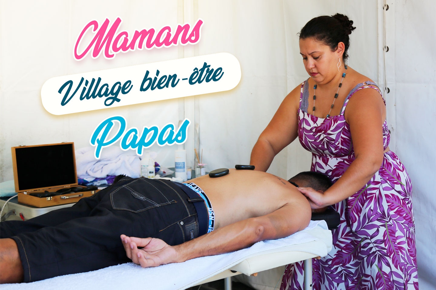 Une femme masse le dos d'une personne sur une table de massage